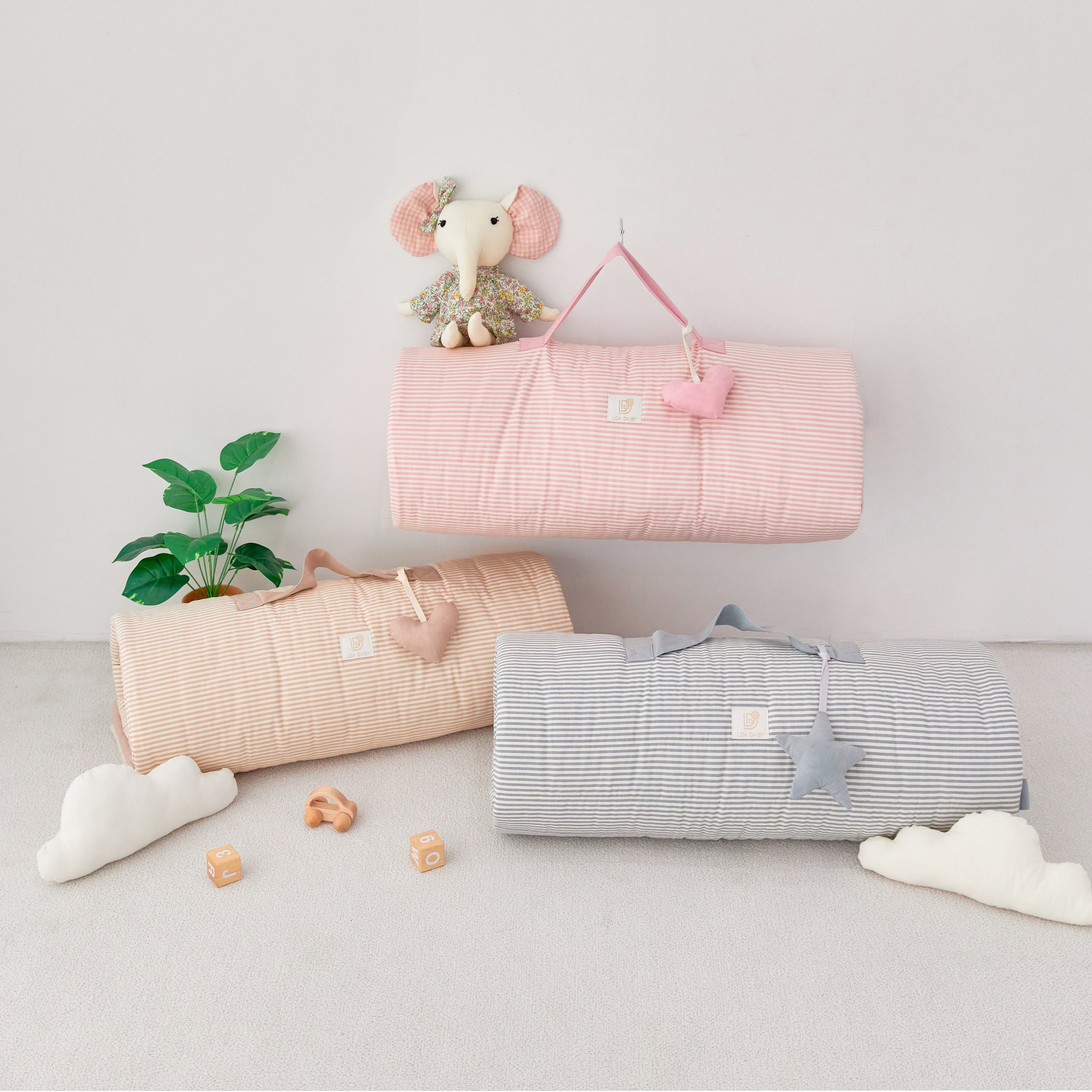 Kid's striped portable nap mat blankets with handles and stuffed toy name tags. Pink stripe, blue stripe, beige stripe back to school gift.
