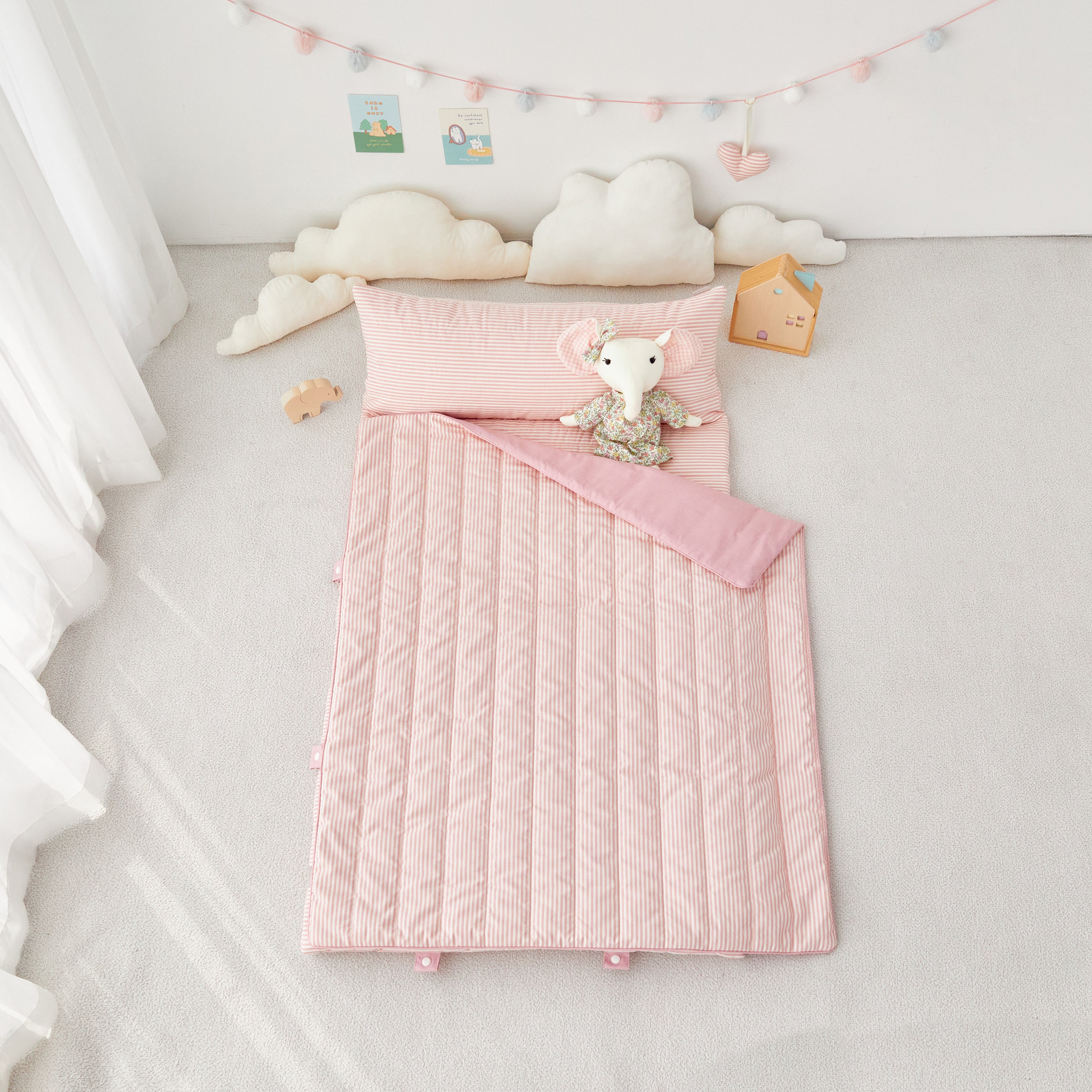 Girl's pink striped portable blanket nap mat with elephant stuffed toy
