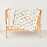 Wooden crib with strawberry print kniited cotton and minky baby stroller blanket 