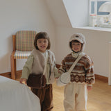 Toddlers wearing Corduroy Comfort Pants in brown and ivory— cozy fall winter outfit look