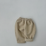 Close-up detail of corduroy texture on toddler ivory Corduroy Comfort Pants