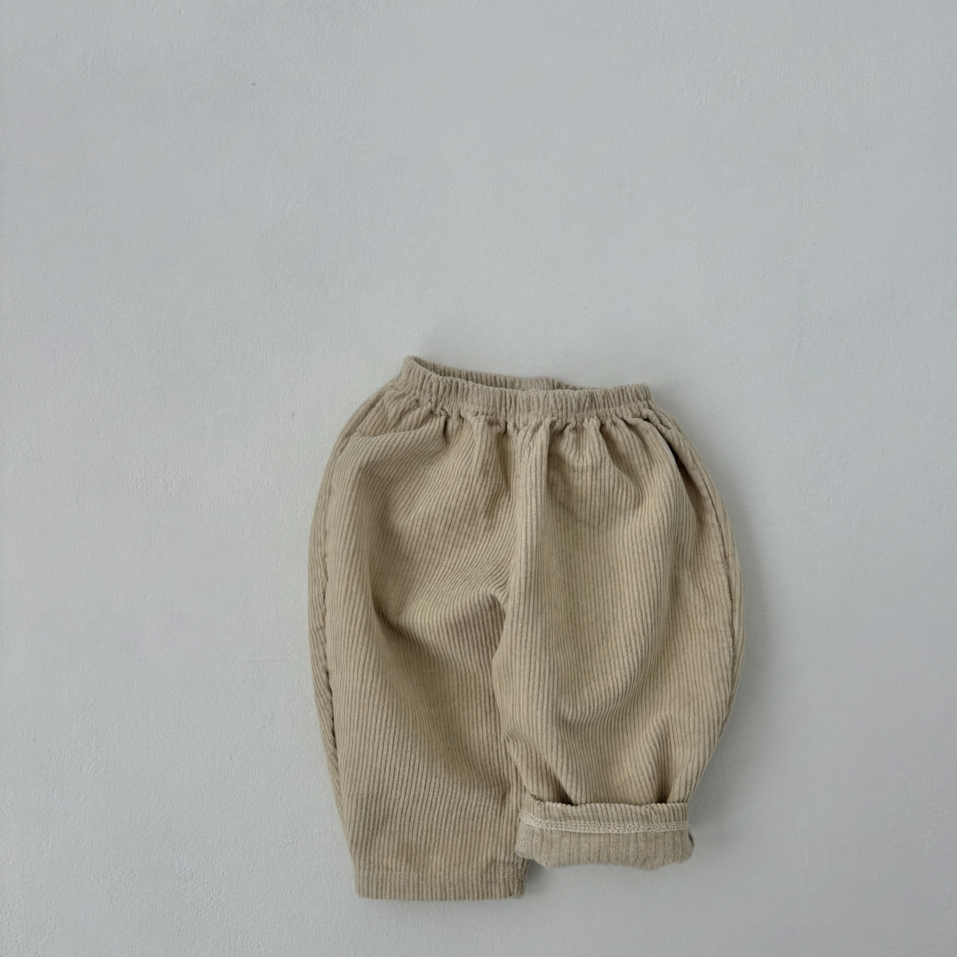 Close-up detail of corduroy texture on toddler ivory Corduroy Comfort Pants