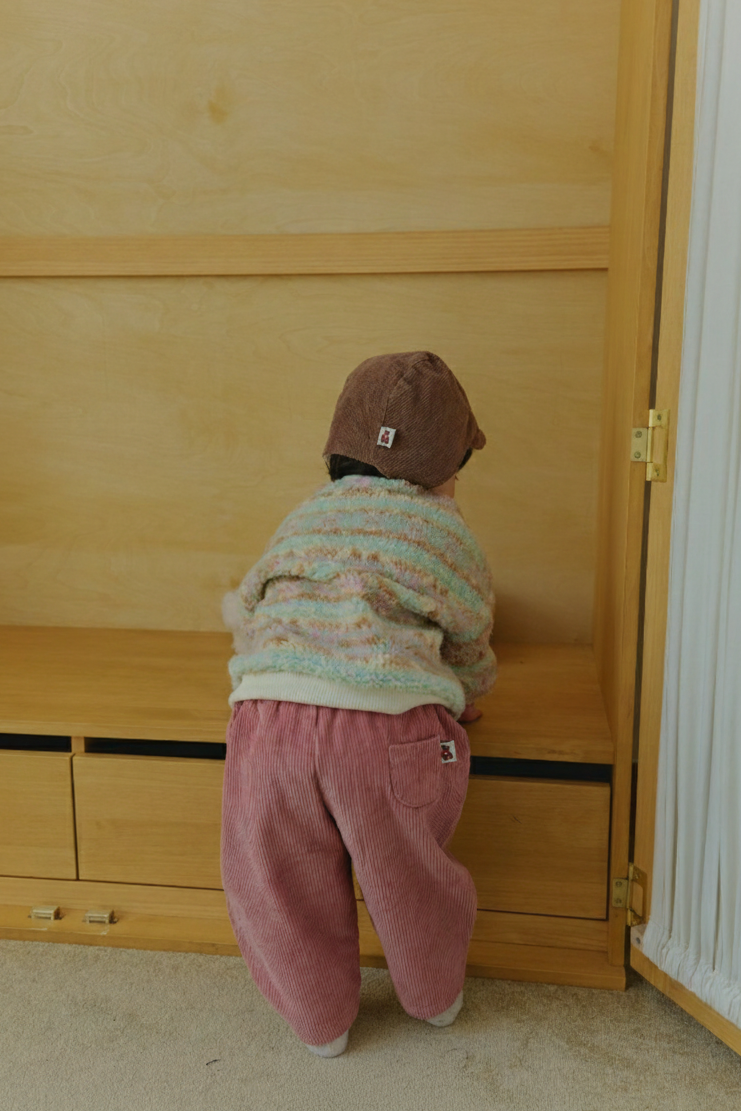 Corduroy Comfort Pants in pink and pink brown, mint green dumble sweater — back view baby & toddler pants and sweater