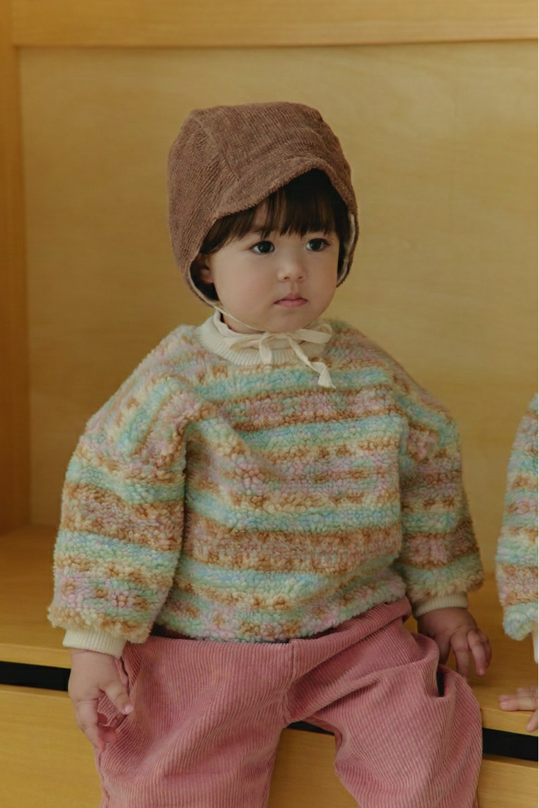 Toddler girl wearing Corduroy Comfort Pants rose pink paired with neutral top for holiday season winter outfit
