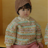 Toddler girl wearing Corduroy Comfort Pants rose pink paired with neutral top for holiday season winter outfit