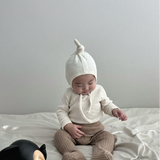 Toddler wearing Cloud Soft Rib Knit Sweater styled with neutral leggings